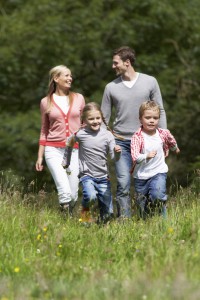 Family On Walk In Countryside
